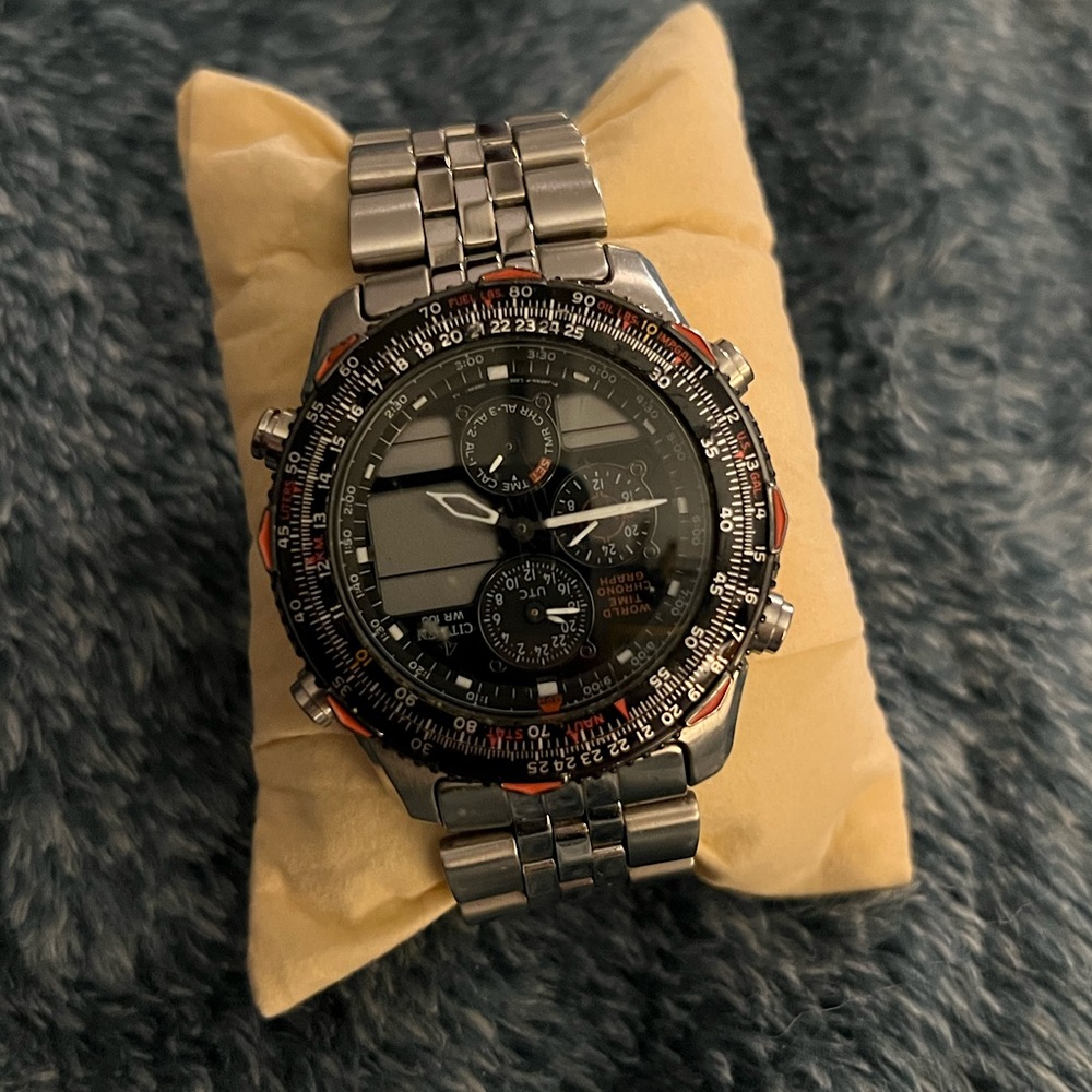 Citizen Navihawk Men’s Watch, used, needs battery. Black red and silver.